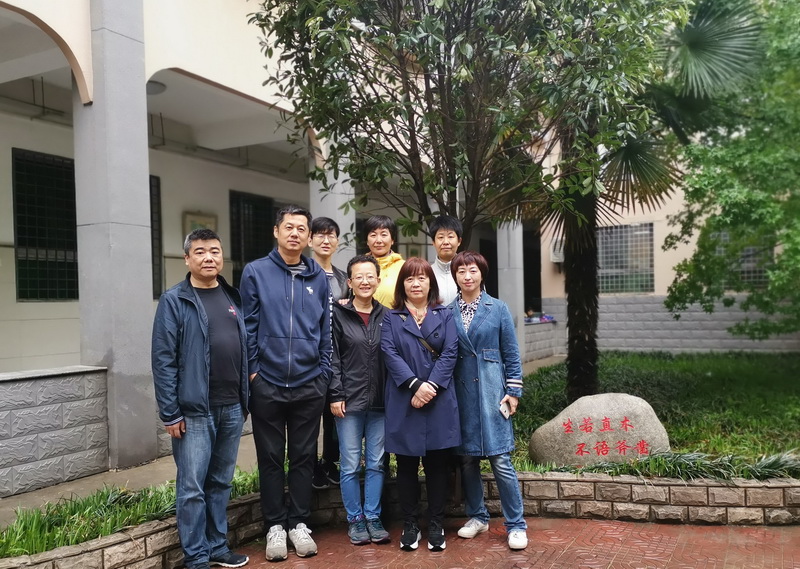 1556005082907086.jpeg 初82级校友捐赠桂树_调整大小.jpg